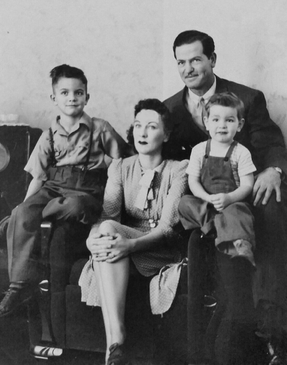 Maurice Hasson with his wife and two little sons