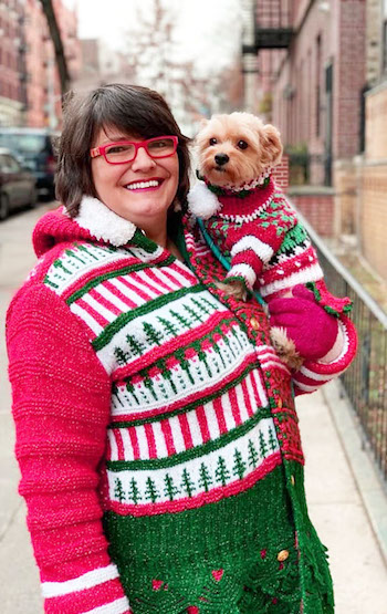 Me holding my cute morkie, both of us dressed in Christmas sweaters, before losing 40 pounds