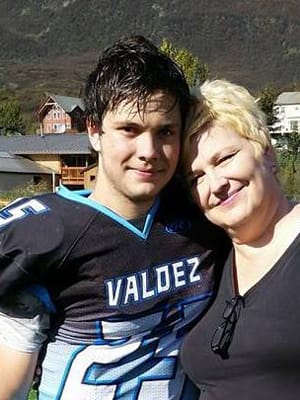 football player with mom